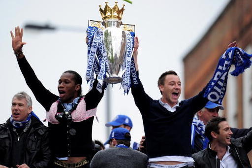LONDON, ENGLAND - MAY 16:  Chelsea captain John Terry and Didier Drogba celebrate with the Premier League Trophy during the Chelsea FC Victory Parade on May 16, 2010 in London, England.  (Photo by Shaun Botterill/Getty Images)