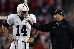 Nov 30, 2013; Madison, WI, USA; Penn State Nittany Lions head coach Bill O'Brien talks to quarterback Christian Hackenberg (14) during the game with the Wisconsin Badgers at Camp Randall Stadium. Penn State defeated Wisconsin 31-24. Mandatory Credit: Mary