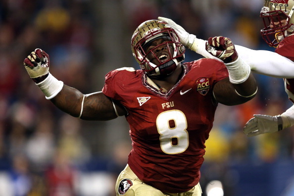CHARLOTTE, NC - DECEMBER 01:  Timmy Jernigan #8 of the Florida State Seminoles reacts after a sack against the Georgia Tech Yellow Jackets during the 2012 ACC Championship game at Bank of America Stadium on December 1, 2012 in Charlotte, North Carolina.  