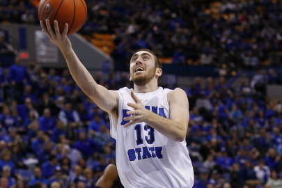 TERRE HAUTE, IN - FEBRUARY 05: Jake Odum #13 of the Indiana State Sycamores shoots a layup against the Wichita State Shockers at Hulman Center on February 5, 2014 in Terre Haute, Indiana. (Photo by Michael Hickey/Getty Images)