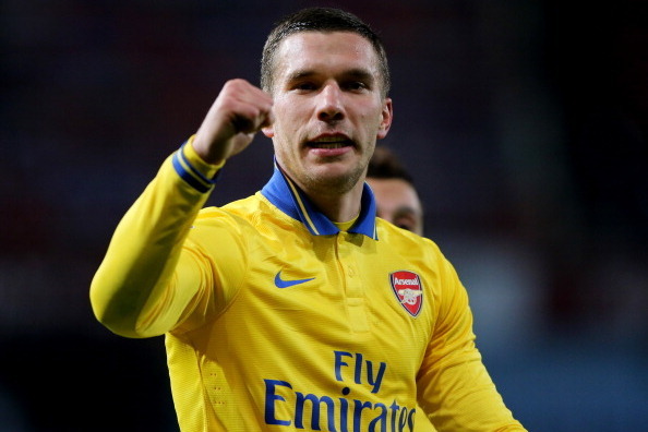 LONDON, ENGLAND - DECEMBER 26:  Lukas Podolski of Arsenal celebrates victory after the Barclays Premier League match between West Ham United and Arsenal at Boleyn Ground on December 26, 2013 in London, England.  (Photo by Ian Walton/Getty Images)