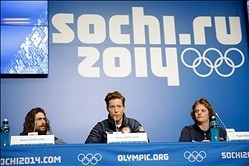 Feb 5, 2014; Krasnaya Polyana, RUSSIA; Shaun White, center, speaks during the USA Snowboarding Halfpipe Press Conference at Gorki Media Center. At left is Danny Davis, and Taylor Gold is at right.  Mandatory Credit: Andrew P. Scott-USA TODAY Sports