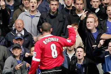 LIVERPOOL, ENGLAND -  AUGUST 13 : Wayne Rooney  of Manchester Utd is acknowledged by the Everton fans after the first goal during the Barclays Premiership match between Everton and Manchester United at Goodison Park on August 13, 2005 in Liverpool, Englan