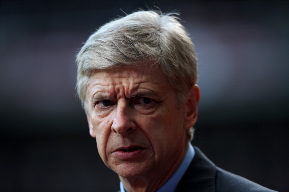 LONDON, ENGLAND - DECEMBER 26:  Arsene Wenger manager of Arsenal looks on prior to the Barclays Premier League match between West Ham United and Arsenal at Boleyn Ground on December 26, 2013 in London, England.  (Photo by Ian Walton/Getty Images)