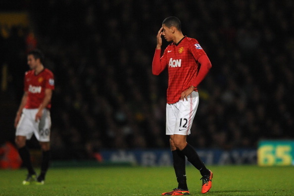 NORWICH, ENGLAND - NOVEMBER 17: Chris Smalling of Manchester United looks dejected during the Barclays Premier League match between Norwich City and Manchester United at Carrow Road on November 17, 2012 in Norwich, England.  (Photo by Christopher Lee/Gett