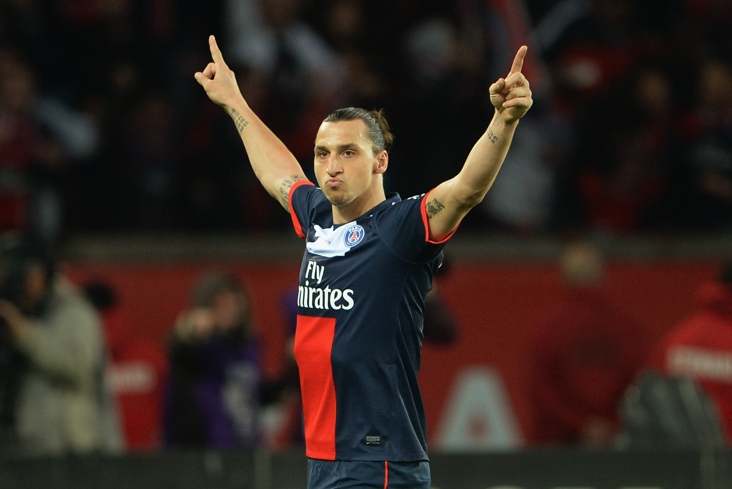 PARIS, FRANCE - MAY 18:  Zlatan Ibrahimovic of PSG celebrates after scoring to make it 3-0 during the Ligue 1 match between Paris Saint-Germain FC and Stade Brestois 29 at Parc des Princes on May 18, 2013 in Paris, France.  (Photo by Michael Regan/Getty I