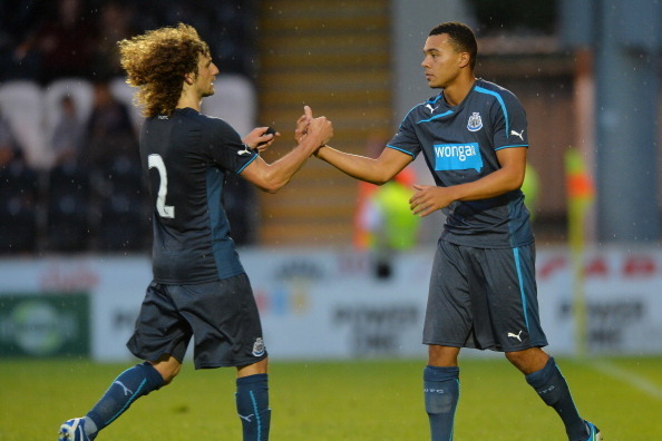 PAISLEY, SCOTLAND - JULY 30: Fabricio Coloccini and Remie Streete of Newcastle during the Pre Season Friendly match between St Mirren and Newcastle United at St Mirren Park on July 30, 2013 in Paisley, Scotland. (Photo by Mark Runnacles/Getty Images)