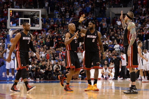 LOS ANGELES, CA - FEBRUARY 5: (L-R) Dwyane Wade #3, Ray Allen #34, LeBron James #6, and Chris Andersen #11 of the Miami Heat celebrate during their game against the Los Angeles Clippers at Staples Center on February 5, 2014 in Los Angeles, California. NOT