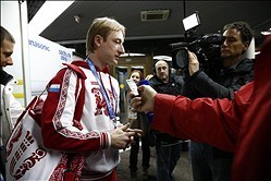 Feb 3, 2014; Sochi, RUS;  Russian figure skater Evgeni Plushenko arrives at the Sochi airport as he is greeted by media for interviews. Mandatory Credit: Rob Schumacher-USA TODAY Sports