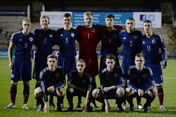 KIRKALDY,  SCOTLAND - NOVEMBER 29 :  The Scotland U16  team pose for a photograph at the start of the Sky Sports Victory Shield match between Scotland U16 and England U16 on November 29, 2013 in Kirkaldy Scotland.  (Photo by Mark Runnacles/Getty Images)