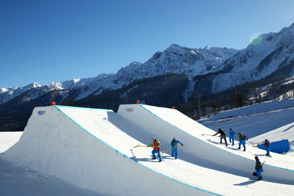SOCHI, RUSSIA - FEBRUARY 06:  Course marshals prepare the jump in the Women's Slopestyle Qualification during the Sochi 2014 Winter Olympics at Rosa Khutor Extreme Park on February 6, 2014 in Sochi, Russia.  (Photo by Cameron Spencer/Getty Images)