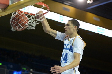 LOS ANGELES, CA - DECEMBER 14:  Zach LaVine #14 of the UCLA Bruins dunks in front of Wanaah Bail #1 during a 95-71 win over the Prairie View A&M Panthers at Pauley Pavilion on December 14, 2013 in Los Angeles, California.  (Photo by Harry How/Getty Images