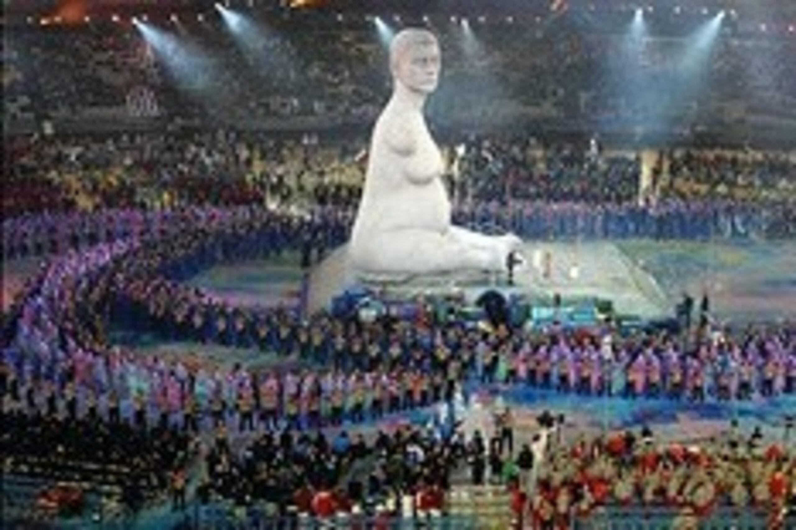 Aug 29, 2012; London, United Kingdom; Dancers perform around a replica of the statue Pregnant by Alison Lapper during the Opening Ceremony for the London 2012 Paralympic Games at Olympic Stadium.  Mandatory Credit: Paul Cunningham-USA TODAY Sports