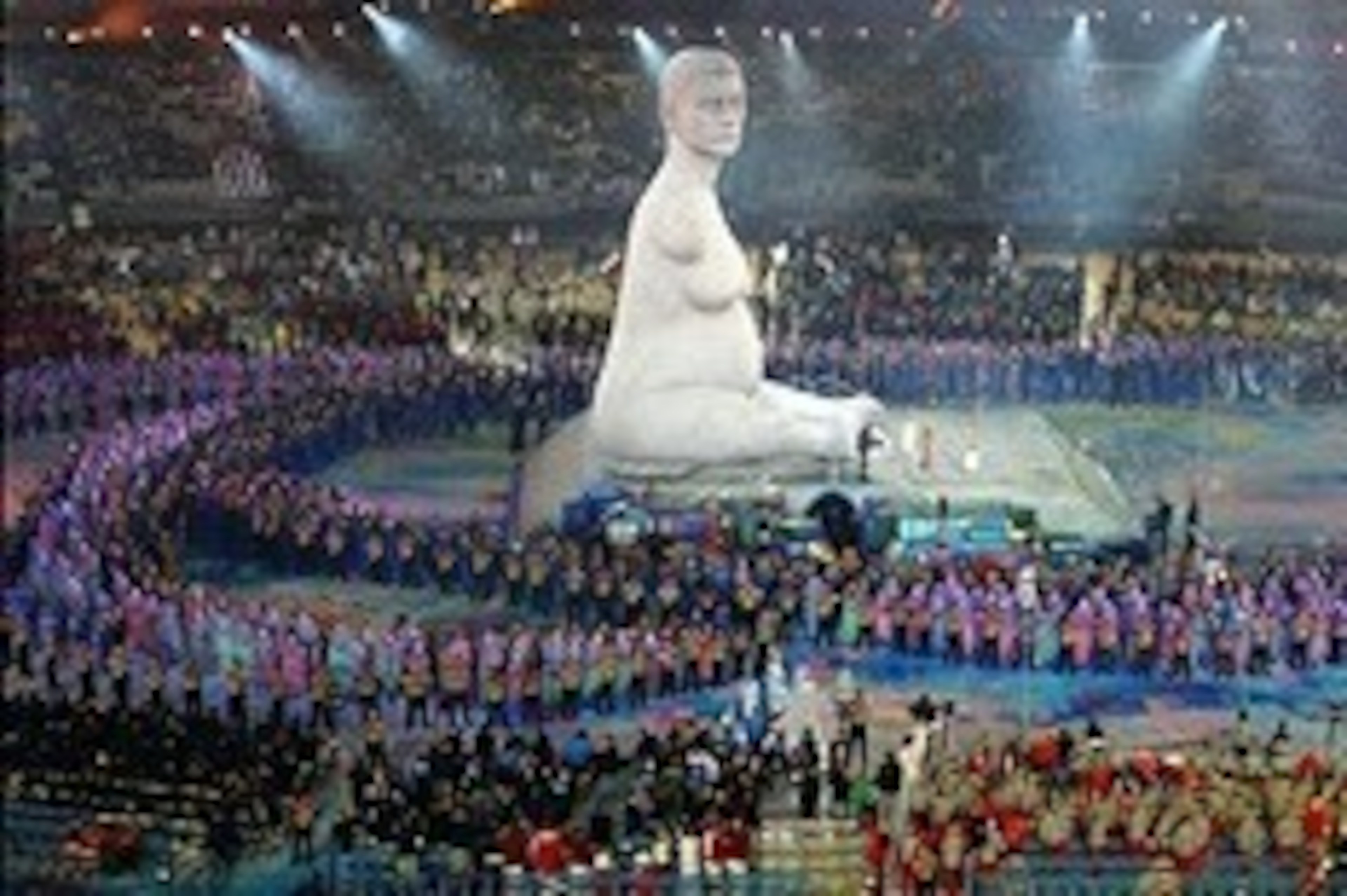Aug 29, 2012; London, United Kingdom; Dancers perform around a replica of the statue Pregnant by Alison Lapper during the Opening Ceremony for the London 2012 Paralympic Games at Olympic Stadium.  Mandatory Credit: Paul Cunningham-USA TODAY Sports