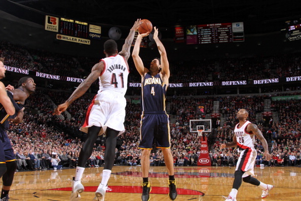 PORTLAND, OR - DECEMBER 2: Luis Scola #4 of the Indiana Pacers shoots against Thomas Robinson #41 of the Portland Trail Blazers on December 2, 2013 at the Moda Center Arena in Portland, Oregon. NOTE TO USER: User expressly acknowledges and agrees that, by