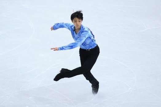 SOCHI, RUSSIA - FEBRUARY 06:  Yuzuru Hanyu of Japan competes in the Figure Skating Men's Short Program during the Sochi 2014 Winter Olympics at Iceberg Skating Palace on February 6, 2014 in Sochi, Russia.  (Photo by Robert Cianflone/Getty Images)