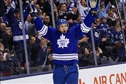 Jan 28, 2014; Toronto, Ontario, CAN; Toronto Maple Leafs forward James van Riemsdyk (21) celebrates after scoring the game winning goal on the Tampa Bay Lightning during the third period at the Air Canada Centre. Toronto defeated Tampa Bay 3-2. Mandatory 