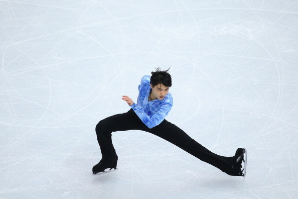 SOCHI, RUSSIA - FEBRUARY 06:  Yuzuru Hanyu of Japan competes in the Figure Skating Men's Short Program during the Sochi 2014 Winter Olympics at Iceberg Skating Palace on February 6, 2014 in Sochi, Russia.  (Photo by Robert Cianflone/Getty Images)