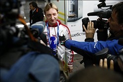 Feb 3, 2014; Sochi, RUS;  Russian figure skater Evgeni Plushenko arrives at the Sochi airport as he is greeted by media for interviews. Mandatory Credit: Rob Schumacher-USA TODAY Sports