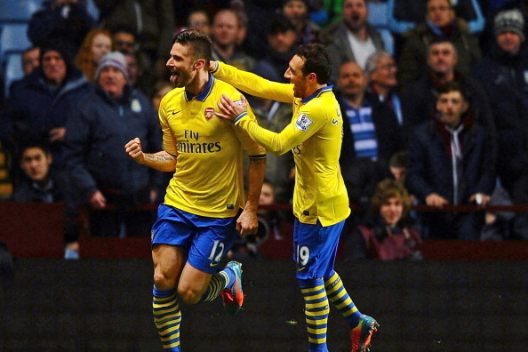 BIRMINGHAM, ENGLAND - JANUARY 13:  Olivier Giroud of Arsenal (L) celebrates scoring their second goal with Santi Cazorla of Arsenal during the Barclays Premier League match between Aston Villa and Arsenal at Villa Park on January 13, 2014 in Birmingham, E
