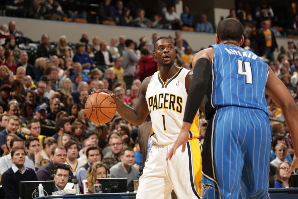 INDIANAPOLIS - FEBRUARY 3: Lance Stephenson #1 of the Indiana Pacers dribbles the ball against the Orlando Magic at Bankers Life Fieldhouse on February 3, 2014 in Indianapolis, Indiana.  NOTE TO USER: User expressly acknowledges and agrees that, by downlo