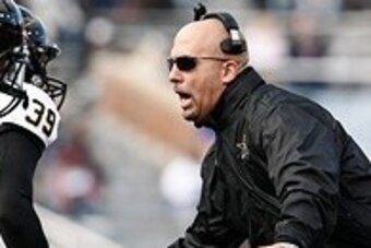 Jan 4, 2014; Birmingham, AL, USA;  Vanderbilt Commodores Coach James Franklin  congratulates his players after scoring a touchdown against the Houston Cougars Coach during the 2014 Compass Bowl at Legion Field. Mandatory Credit: Marvin Gentry-USA TODAY Sp
