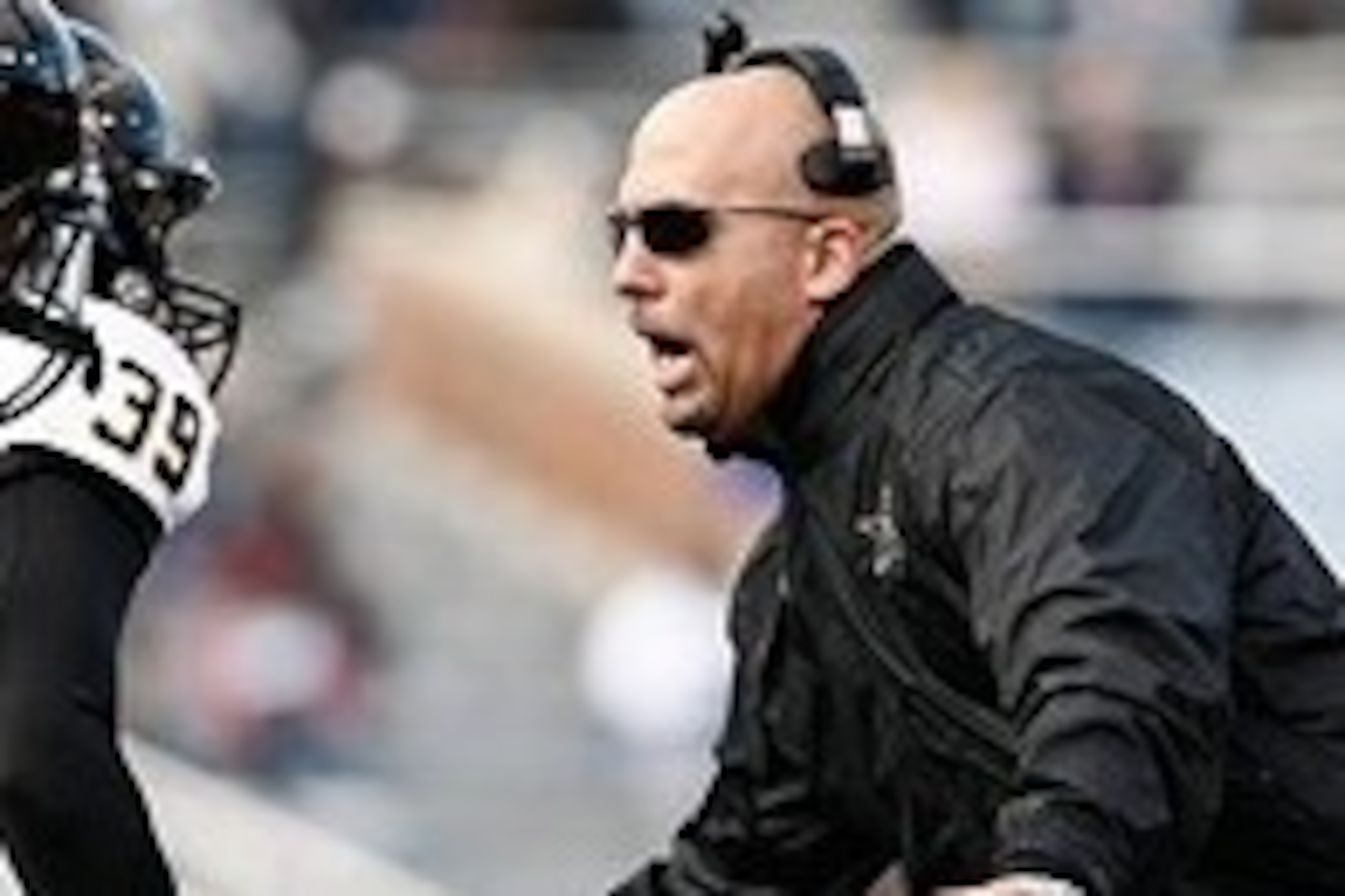 Jan 4, 2014; Birmingham, AL, USA;  Vanderbilt Commodores Coach James Franklin  congratulates his players after scoring a touchdown against the Houston Cougars Coach during the 2014 Compass Bowl at Legion Field. Mandatory Credit: Marvin Gentry-USA TODAY Sp