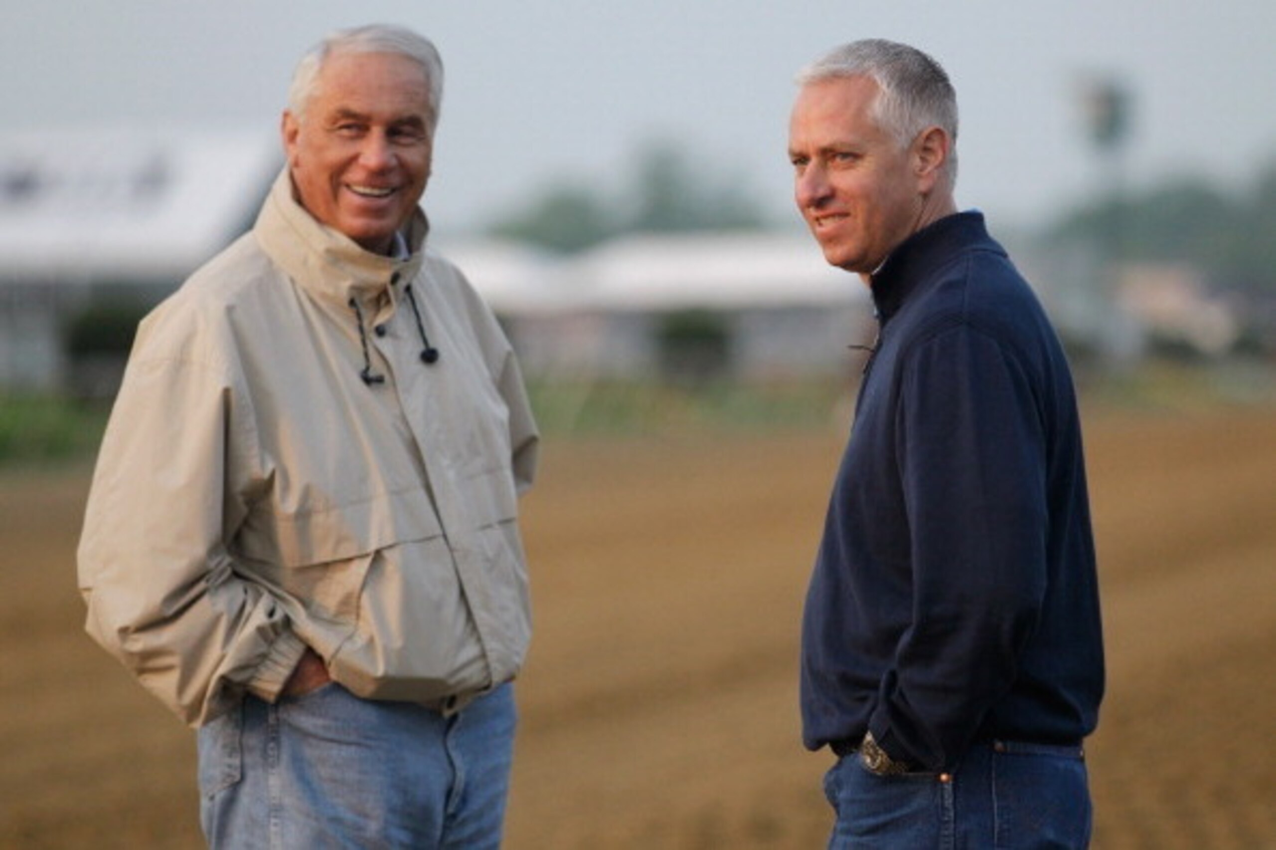 BALTIMORE, MD - MAY 20: Trainers D. Wayne Lucas (L) and Todd Pletcher (R) talk as Pletcher watches his Preakness horse Dance City go over the track at Pimlico Race Course on May 20, 2011 in Baltimore, Maryland. The 136th running of the Preakness Stakes wi