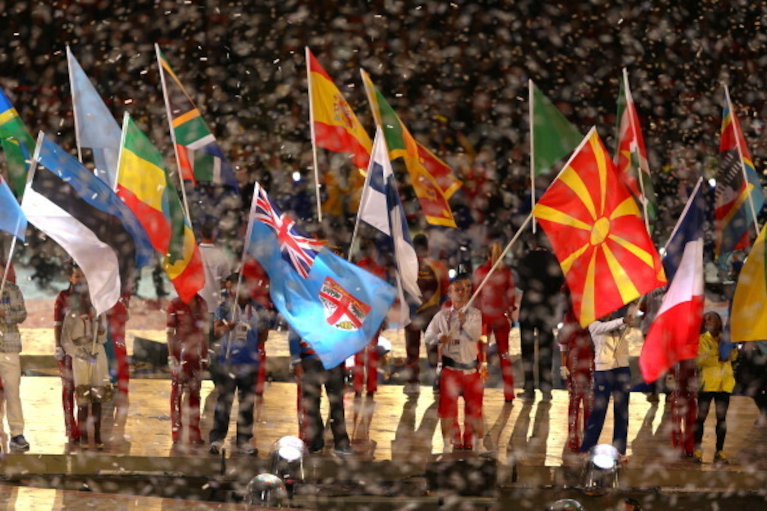 LONDON, ENGLAND - AUGUST 12: Flag bearing athletes parade during the Closing Ceremony on Day 16 of the London 2012 Olympic Games at Olympic Stadium on August 12, 2012 in London, England. (Photo by Paul Gilham/Getty Images) LONDON, ENGLAND - AUGUST 12: Flag bearing athletes parade during the Closing Ceremony on Day 16 of the London 2012 Olympic Games at Olympic Stadium on August 12, 2012 in London, England. (Photo by Paul Gilham/Getty Images)