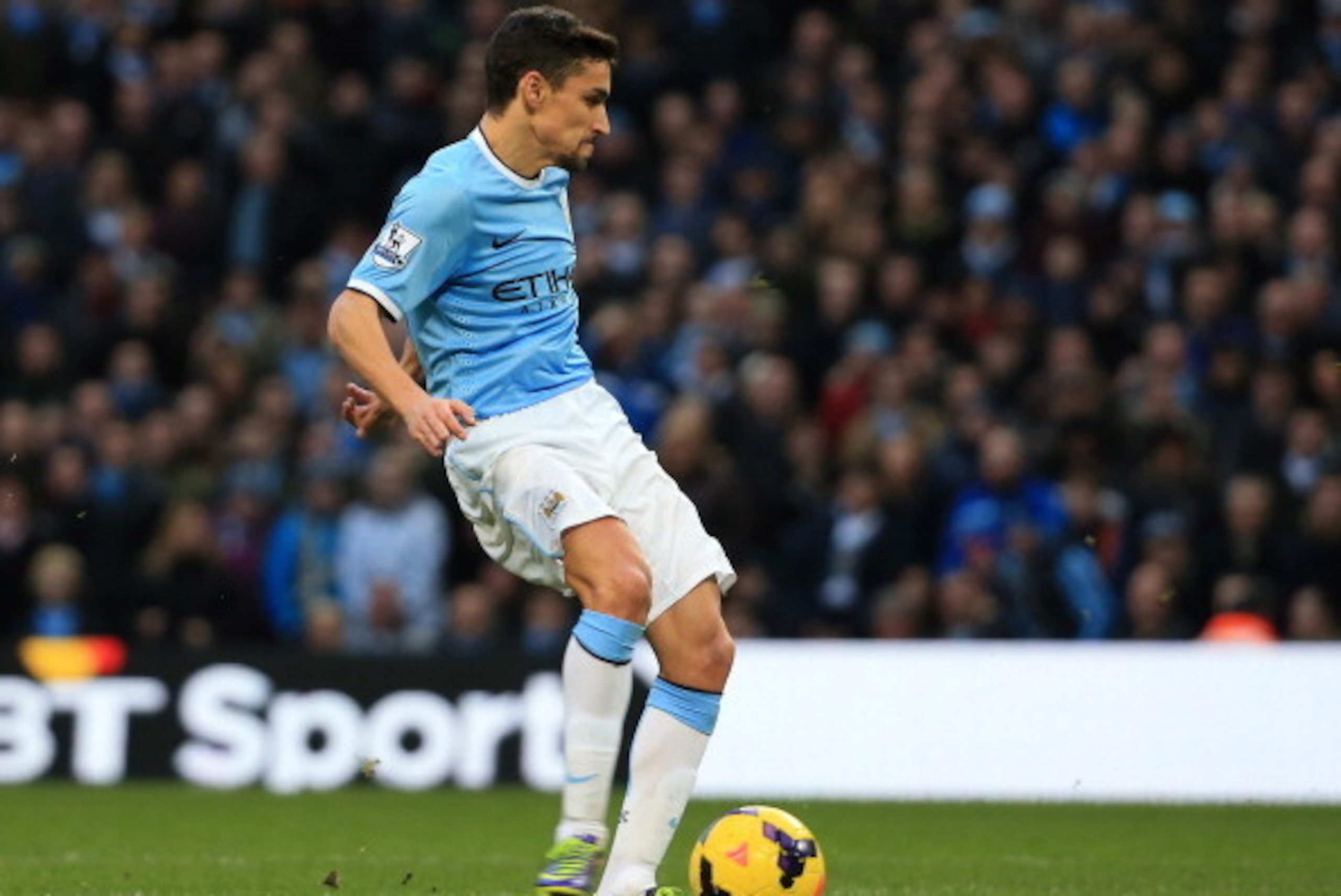 MANCHESTER, ENGLAND - JANUARY 18: Jesus Navas of Manchester City scores his team's second goal during the Barclays Premier League match between Manchester City and Cardiff City at the Etihad Stadium on January 18, 2014 in Manchester, England. (Photo by MANCHESTER, ENGLAND - JANUARY 18: Jesus Navas of Manchester City scores his team's second goal during the Barclays Premier League match between Manchester City and Cardiff City at the Etihad Stadium on January 18, 2014 in Manchester, England. (Photo by