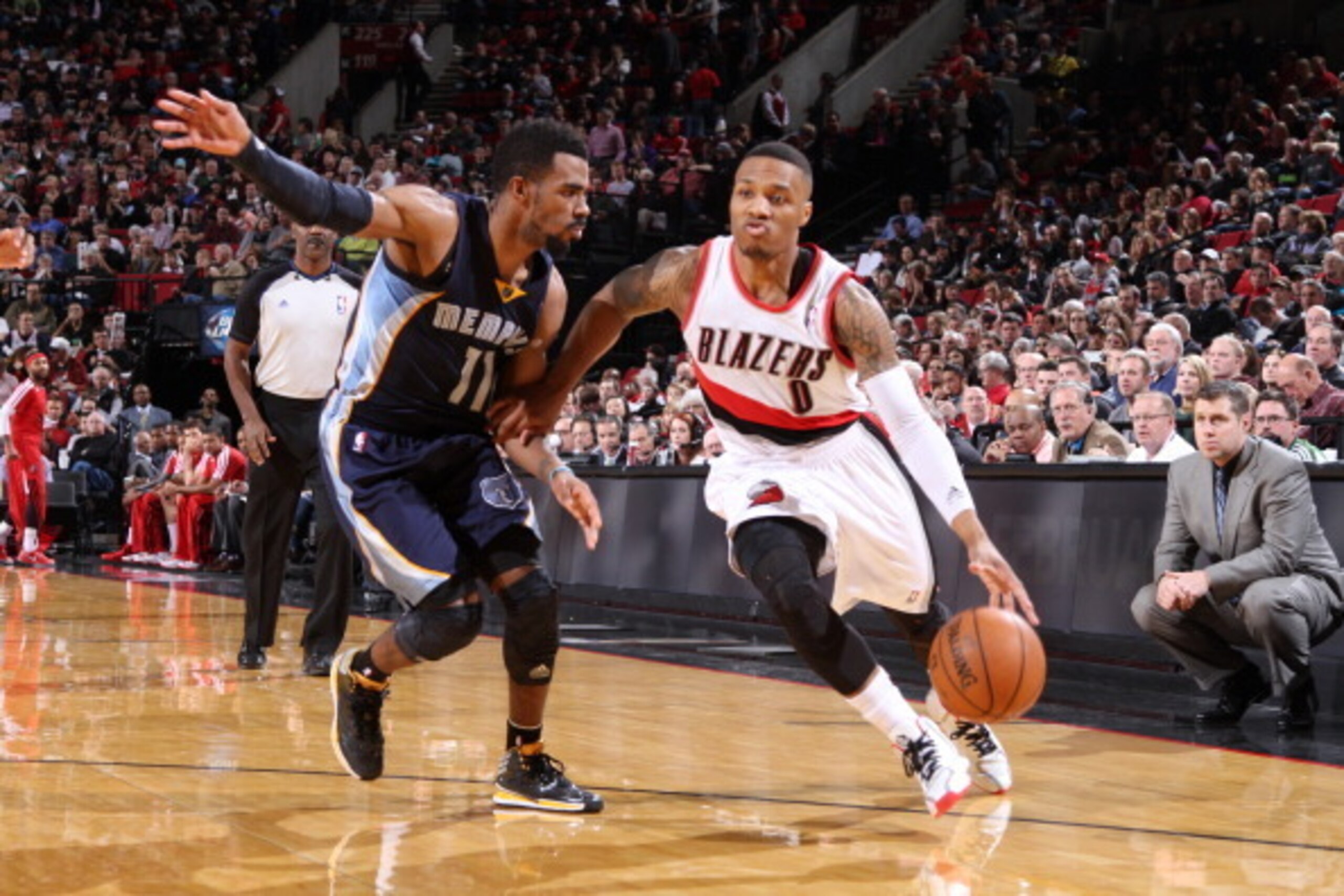 PORTLAND, OR - JANUARY 28: Damian Lillard #0 of the Portland Trailblazers dribbles to the basket against the Memphis Grizzlies at the Moda Center Arena in Portland, Oregon. NOTE TO USER: User expressly acknowledges and agrees that, by downloading and or u