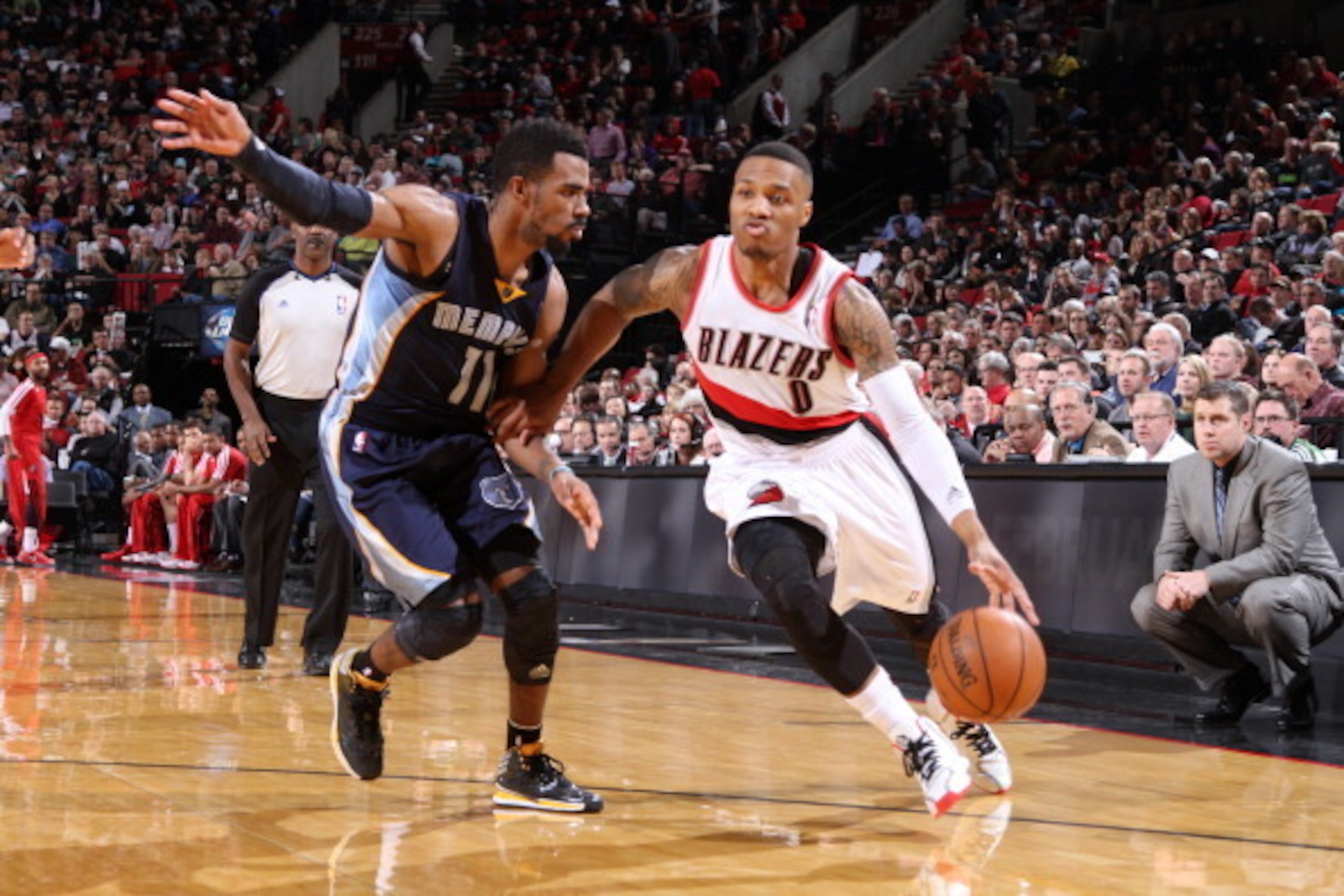 PORTLAND, OR - JANUARY 28: Damian Lillard #0 of the Portland Trailblazers dribbles to the basket against the Memphis Grizzlies at the Moda Center Arena in Portland, Oregon. NOTE TO USER: User expressly acknowledges and agrees that, by downloading and or u