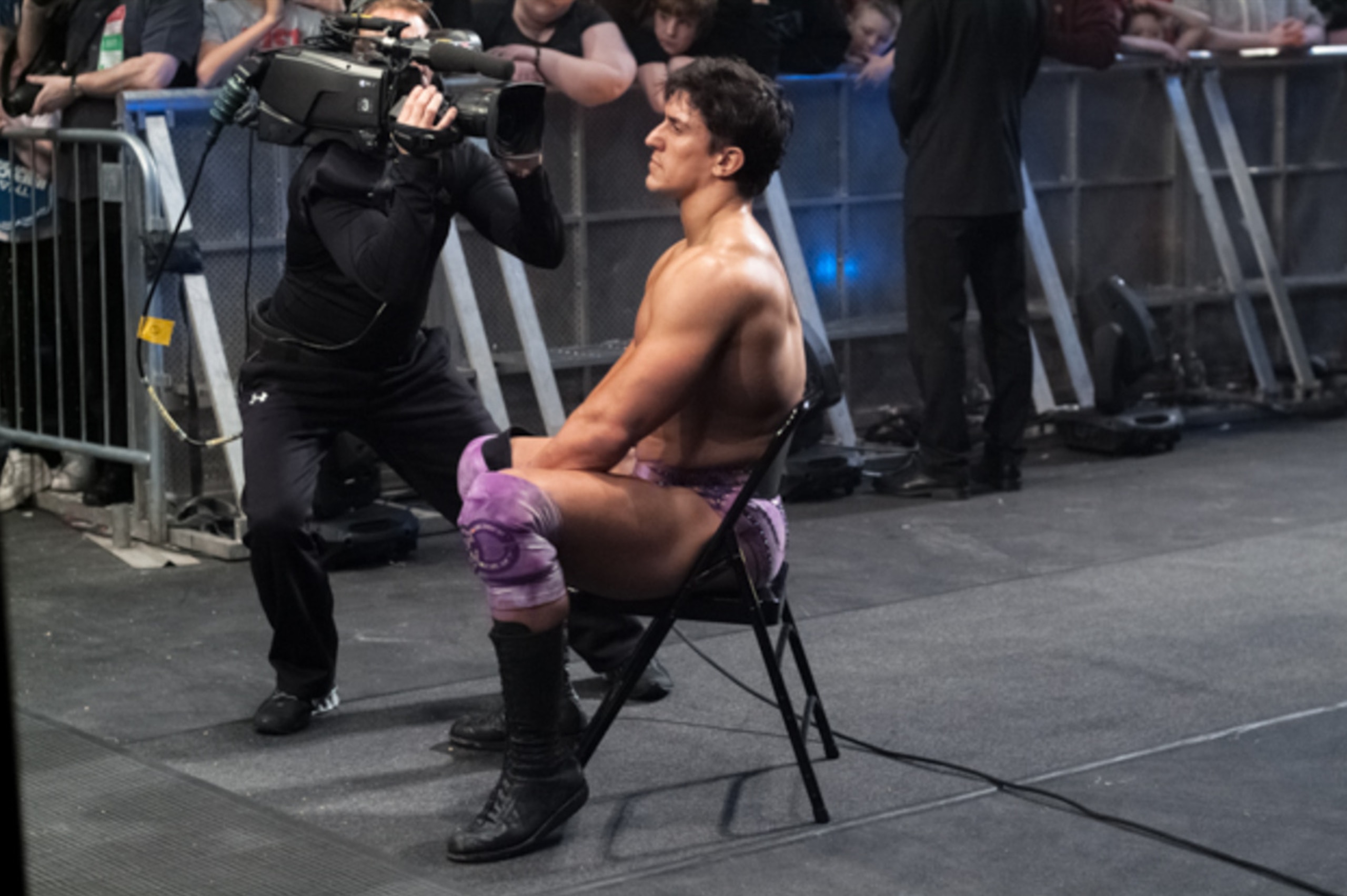 Ethan Carter III watches Kurt Angle at ringside. Ethan Carter III watches Kurt Angle at ringside.