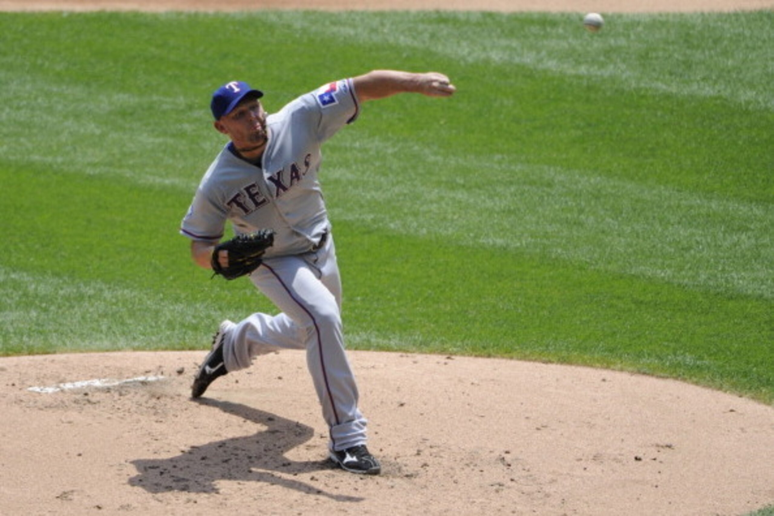 CHICAGO, IL - JULY 05: Matt Harrison #54 of the Texas Rangers pitches against the Chicago White Sox in the first inning on July 5, 2012 at U.S. Cellular Field in Chicago, Illinois.  (Photo by David Banks/Getty Images)