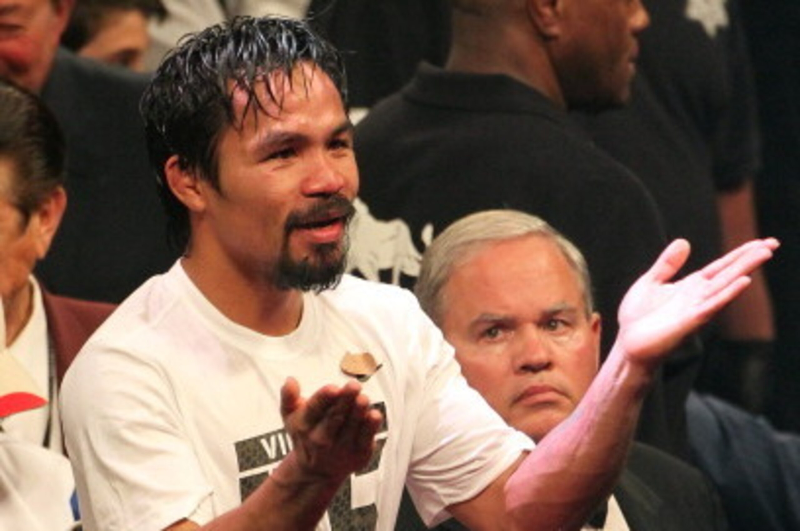 LAS VEGAS, NV - JUNE 09:  Manny Pacquiao salutes the crowd after his fight against Timothy Bradley at MGM Grand Garden Arena on June 9, 2012 in Las Vegas, Nevada.  (Photo by Jeff Bottari/Getty Images)