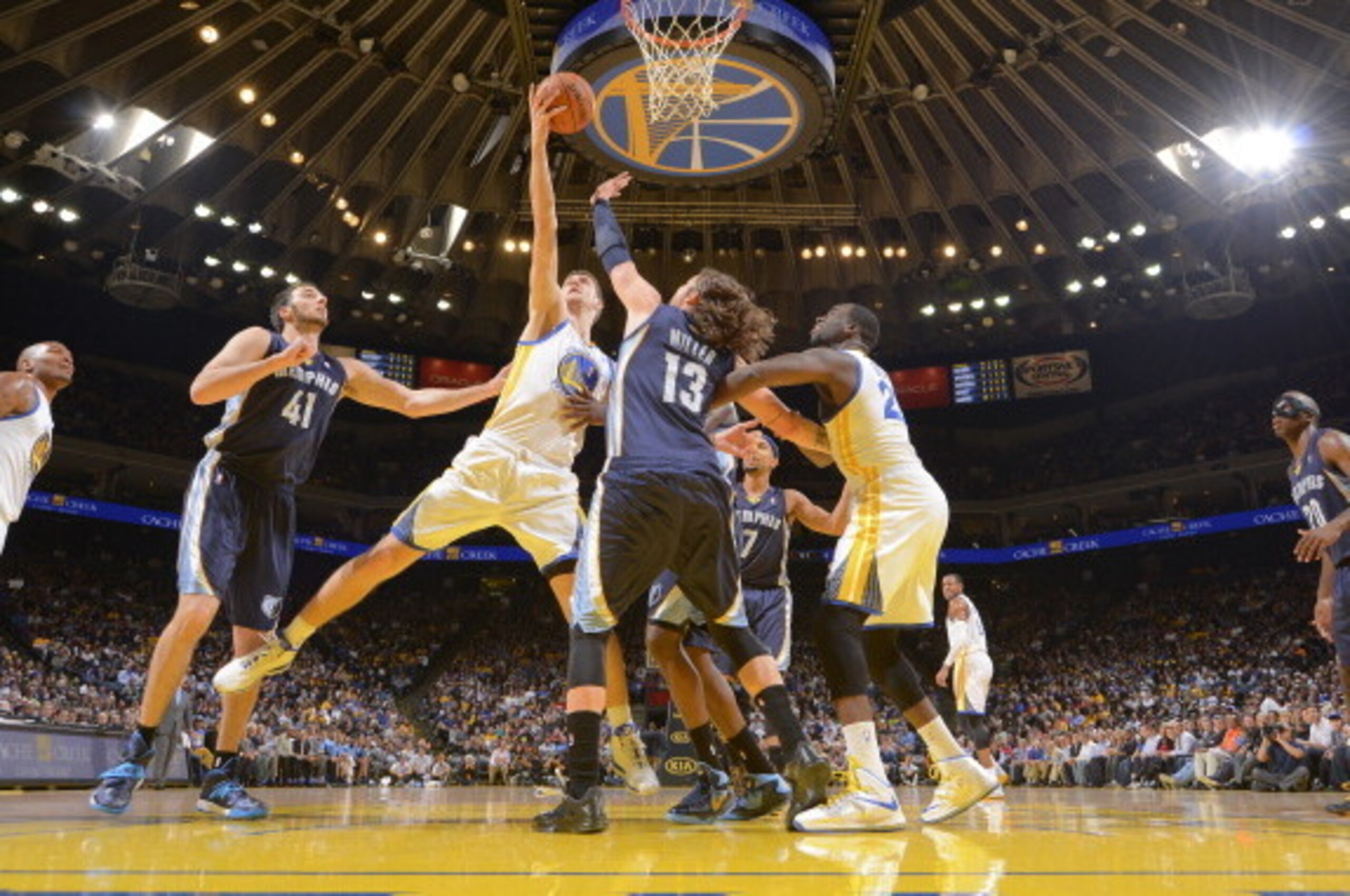 OAKLAND, CA - NOVEMBER 20: Ognjen Kuzmic #1 of the Golden State Warriors shoots a layup against the Memphis Grizzlies on November 20, 2013 at Oracle Arena in Oakland, California. NOTE TO USER: User expressly acknowledges and agrees that, by downloading an