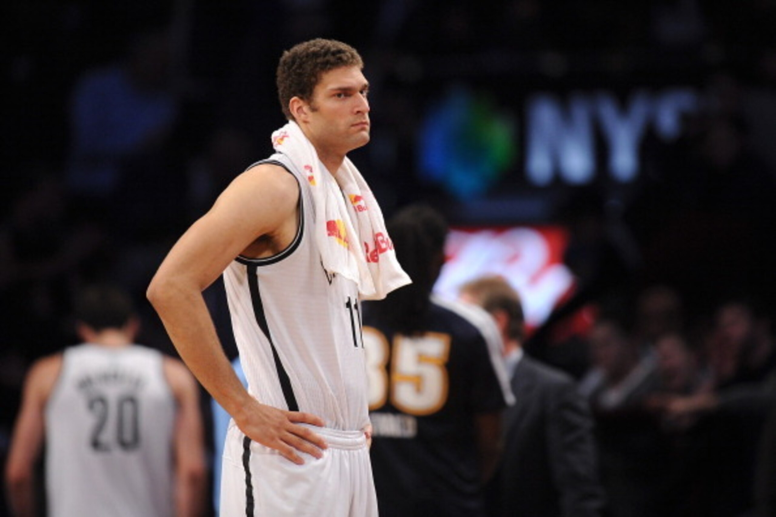 NEW YORK, NY - DECEMBER 03:  Brook Lopez #11 of the Brooklyn Nets looks on during the second half against the Denver Nuggets at Barclays Center on December 3, 2013 in the Brooklyn borough of New York City. The Nuggets defeat the Nets 111-87. NOTE TO USER: