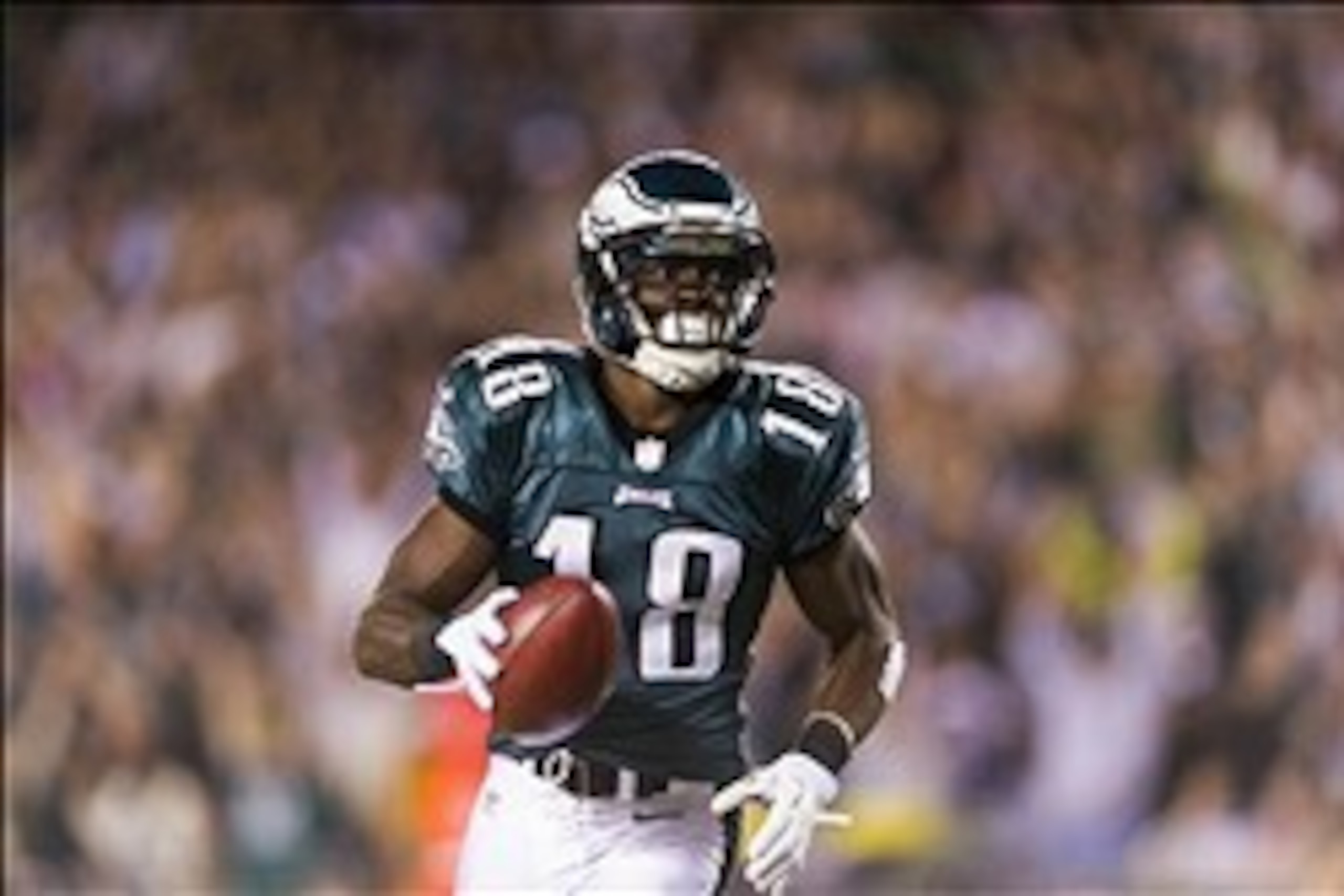 Nov 11, 2012; Philadelphia, PA, USA; Philadelphia Eagles wide receiver Jeremy Maclin (18) scores a touchdown during the third quarter against the Dallas Cowboys at Lincoln Financial Field. The Cowboys defeated the Eagles 38-23. Mandatory Credit: Howard Sm