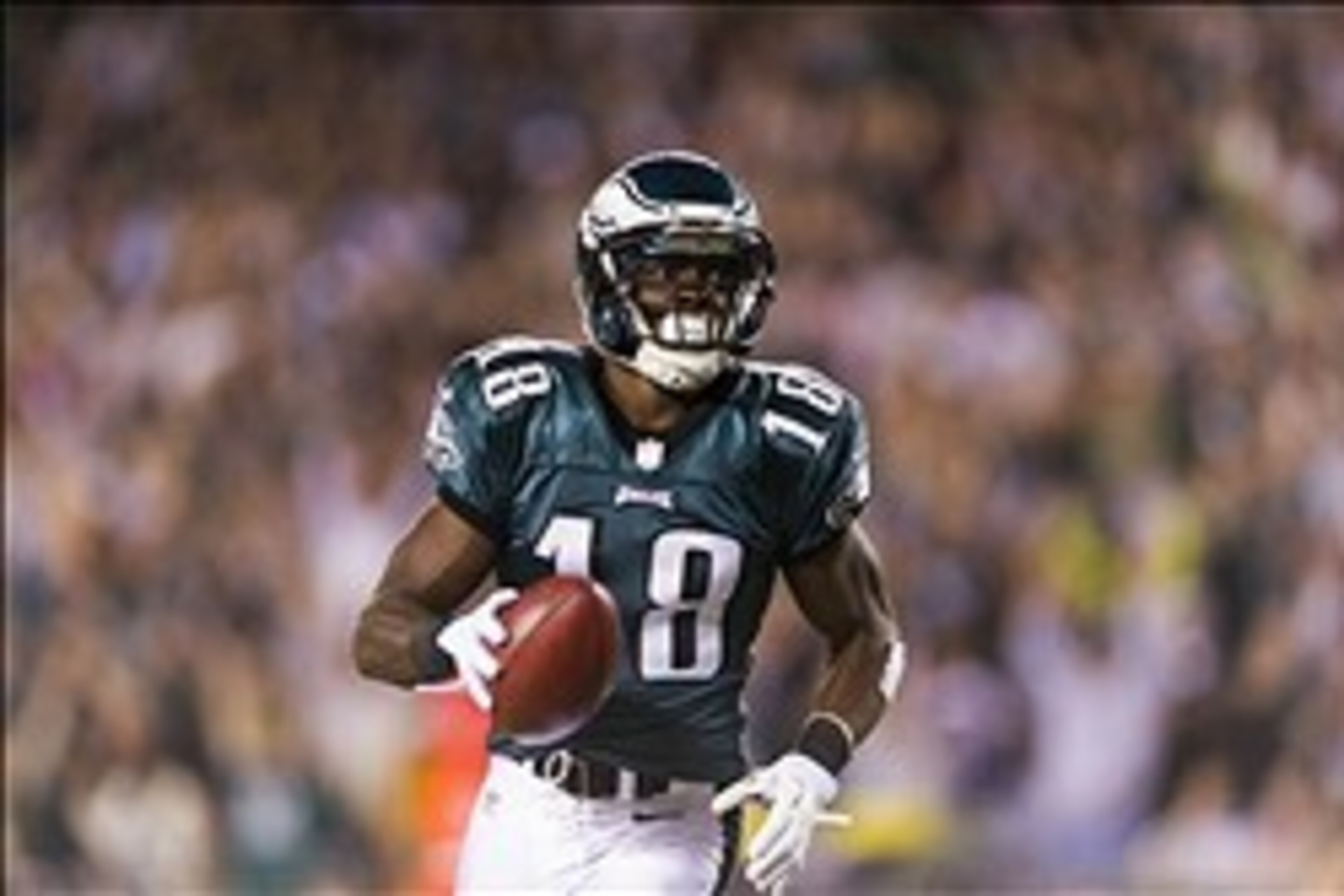 Nov 11, 2012; Philadelphia, PA, USA; Philadelphia Eagles wide receiver Jeremy Maclin (18) scores a touchdown during the third quarter against the Dallas Cowboys at Lincoln Financial Field. The Cowboys defeated the Eagles 38-23. Mandatory Credit: Howard Sm