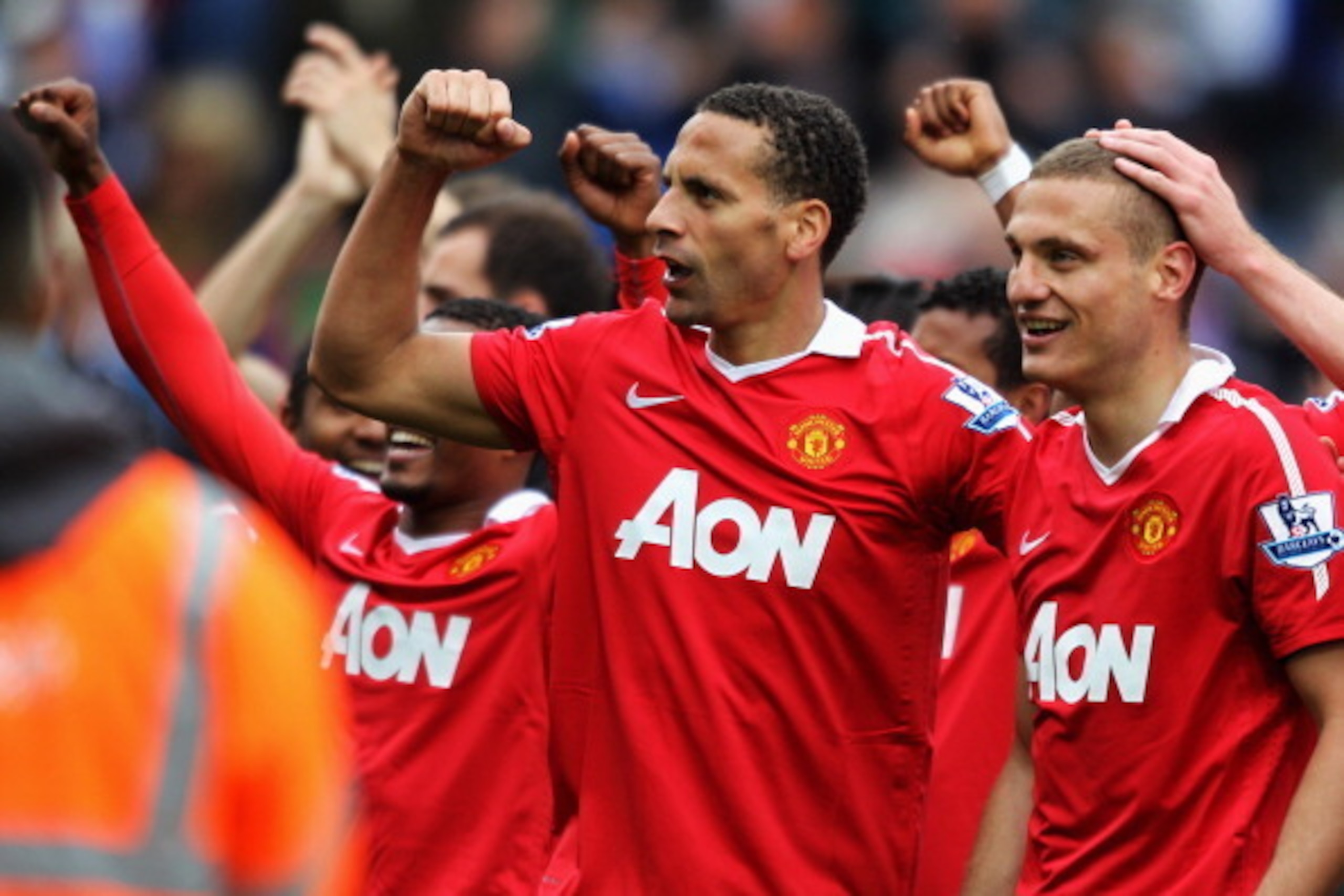 BLACKBURN, ENGLAND - MAY 14:  Rio Ferdinand and Nemanja Vidic of Manchester United celebrate after drawing the Barclays Premier League match between Blackburn Rovers and Manchester United but winning the title at Ewood park on May 14, 2011 in Blackburn, E
