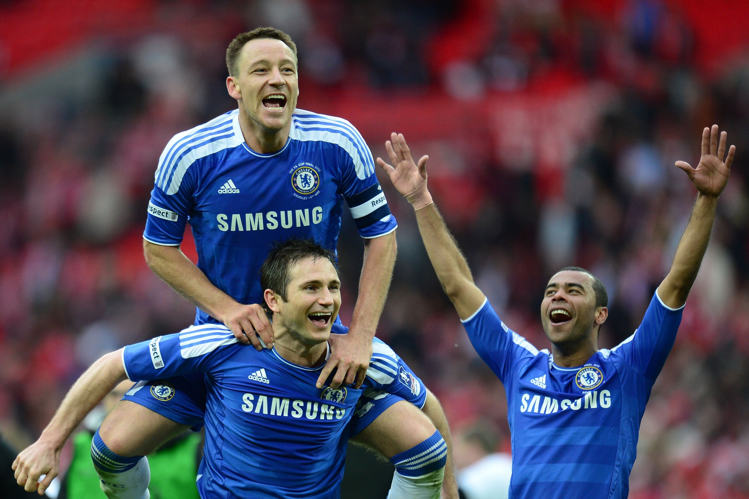LONDON, ENGLAND - MAY 05: John Terry, Frank Lampard and Ashley Cole of Chelsea celebrate victory after the FA Cup with Budweiser Final match between Liverpool and Chelsea at Wembley Stadium on May 5, 2012 in London, England.  (Photo by Shaun Botterill/Get