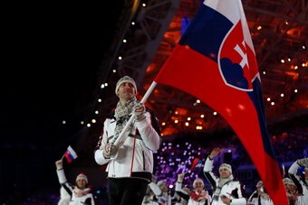 SOCHI, RUSSIA - FEBRUARY 07:  Ice hockey player Zdeno Chara of the Slovakia Olympic team carries his country's flag during the Opening Ceremony of the Sochi 2014 Winter Olympics at Fisht Olympic Stadium on February 7, 2014 in Sochi, Russia.  (Photo by Rya