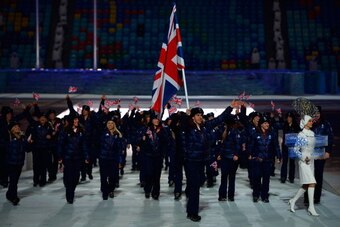 SOCHI, RUSSIA - FEBRUARY 07:  Short track speed skater Jon Eley of the Great Britain Olympic team carries his country's flag during the Opening Ceremony of the Sochi 2014 Winter Olympics at Fisht Olympic Stadium on February 7, 2014 in Sochi, Russia.  (Pho