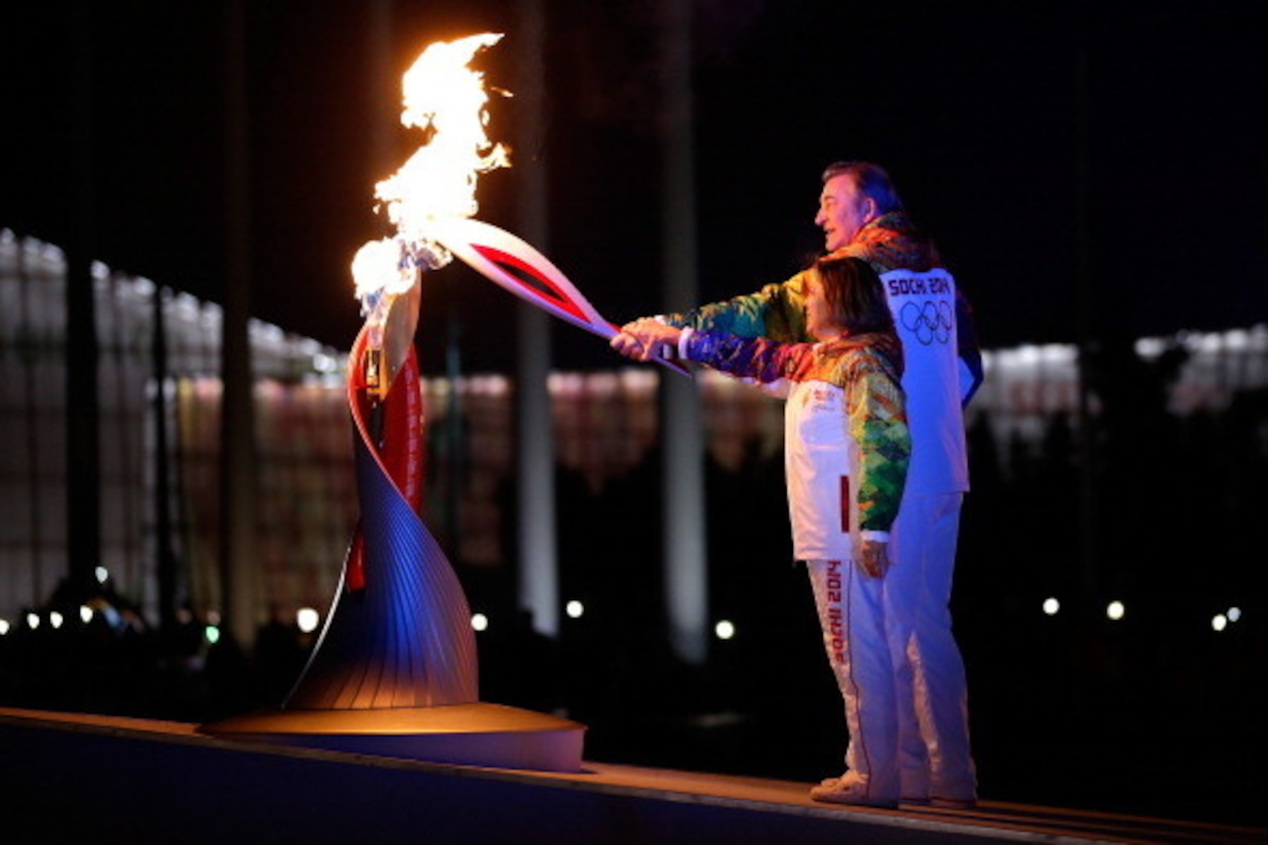 SOCHI, RUSSIA - FEBRUARY 07:  Irina Rodnina and Vladislav Tretyak light the Olympic cauldron during the opening ceremony of the 2014 Winter Olympics in Sochi, Russia, Friday, Feb. 7, 2014.   (Photo by Matt Slocum - Pool/Getty Images)