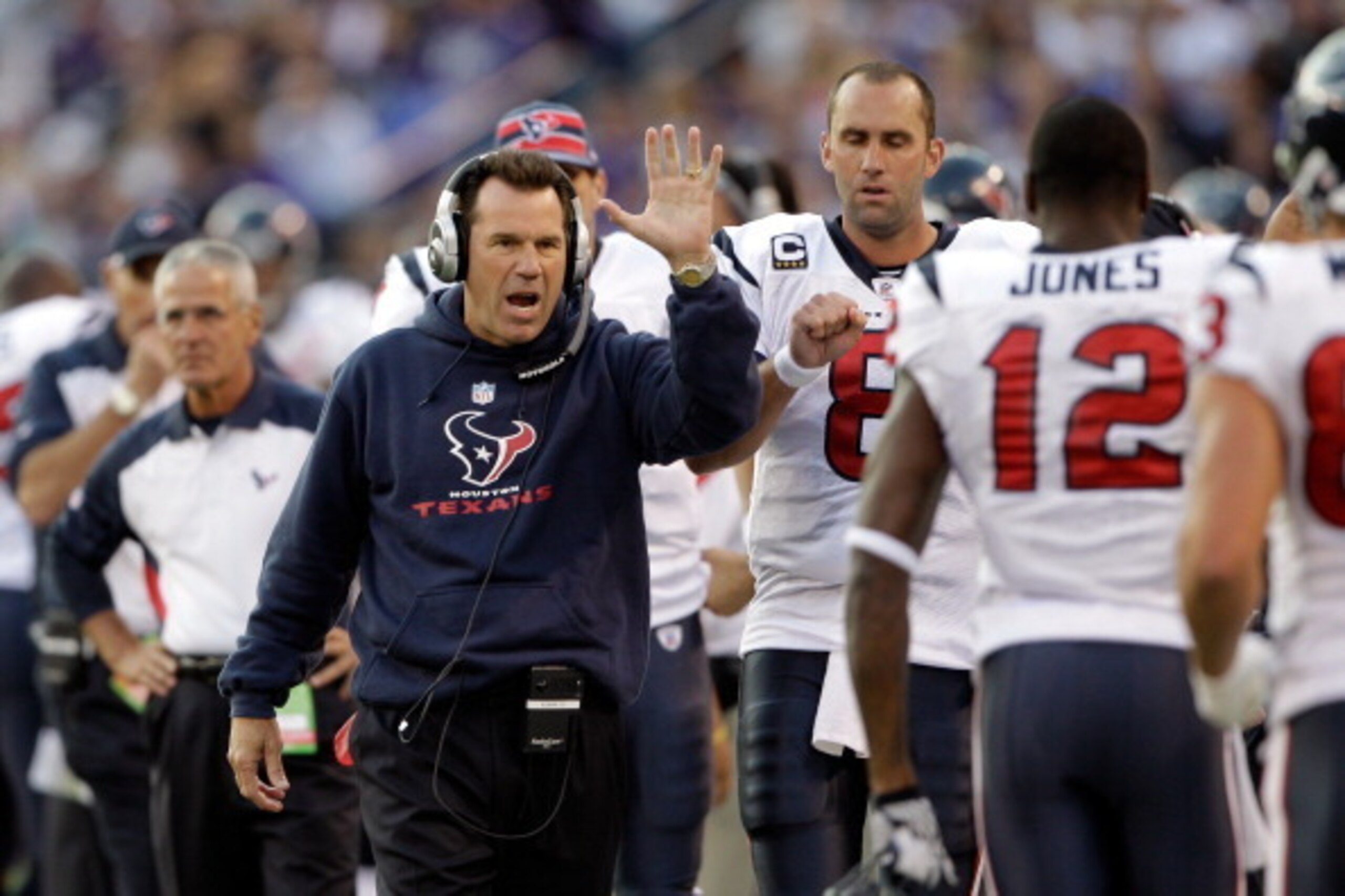 BALTIMORE, MD - OCTOBER 16: Head coach Gary Kubiak of the Houston Texans celebrates a first half touchdown with wide receiver Jacoby Jones #12 against the Baltimore Ravens at M&T Bank Stadium on October 16, 2011 in Baltimore, Maryland. The Ravens won 29-1