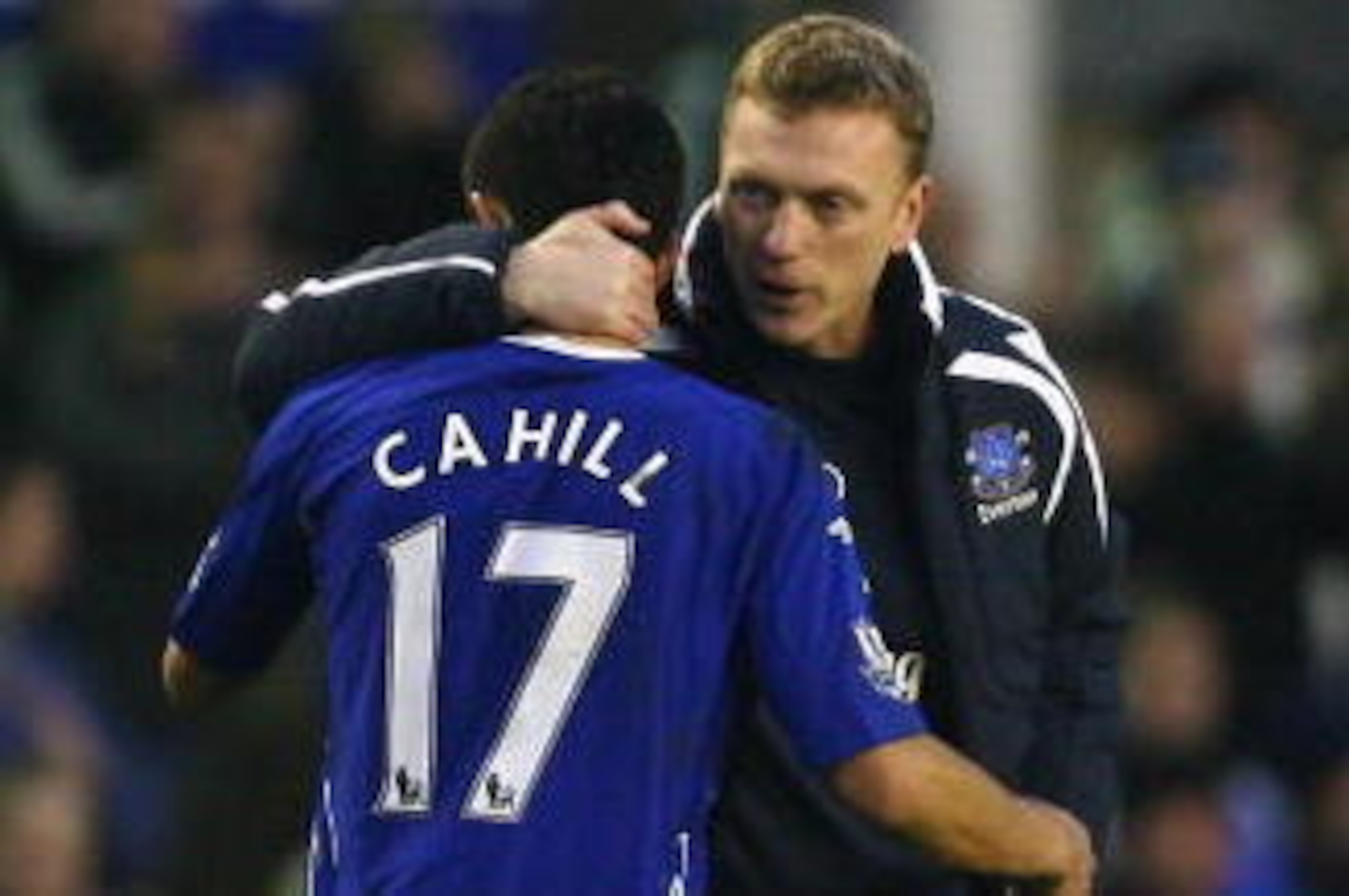 LIVERPOOL, UNITED KINGDOM - MARCH 02:  David Moyes the manager of Everton celebrates with Tim Cahill after victory over Portsmouth in the Barclays Premier League match between Everton and Portsmouth at Goodison Park on March 2, 2008 in Everton, England.  