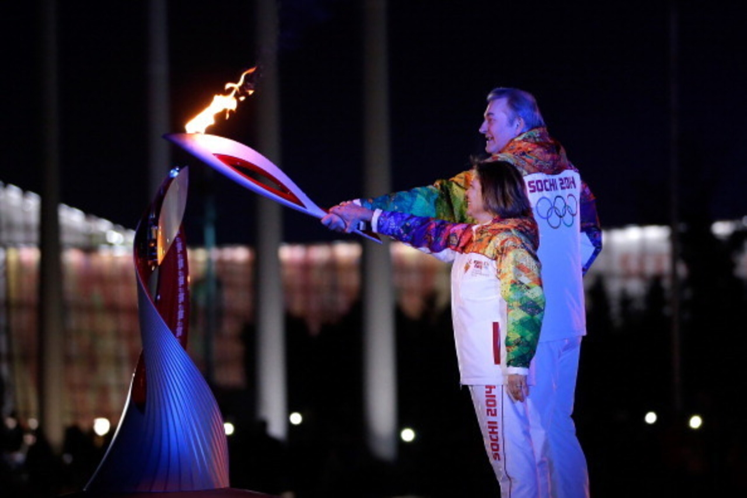 SOCHI, RUSSIA - FEBRUARY 07:  Irina Rodnina and Vladislav Tretyak light the Olympic cauldron during the opening ceremony of the 2014 Winter Olympics in Sochi, Russia, Friday, Feb. 7, 2014.  (Photo by Matt Slocum - Pool/Getty Images)