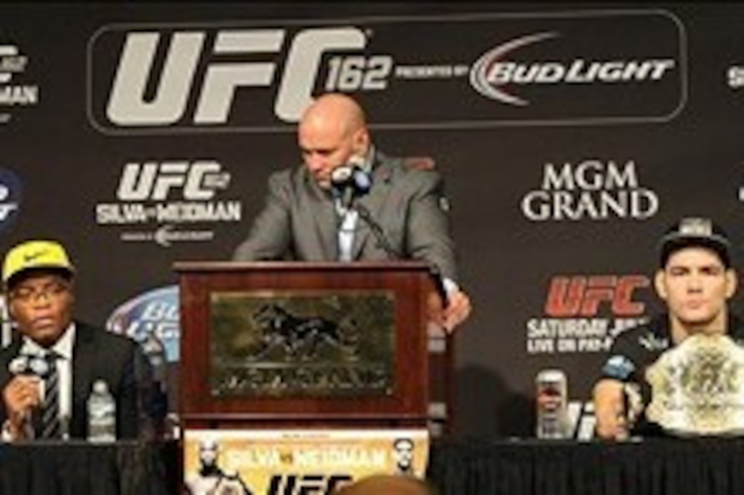 Jul 6, 2013; Las Vegas, NV, USA;  Anderson Silva, left, Dana White and Chris Weidman during the post fight press conference at the MGM Grand Garden Arena. Weidman defeated Silva for the Middleweight Chamionship in a TKO in the second round. Mandatory Cred