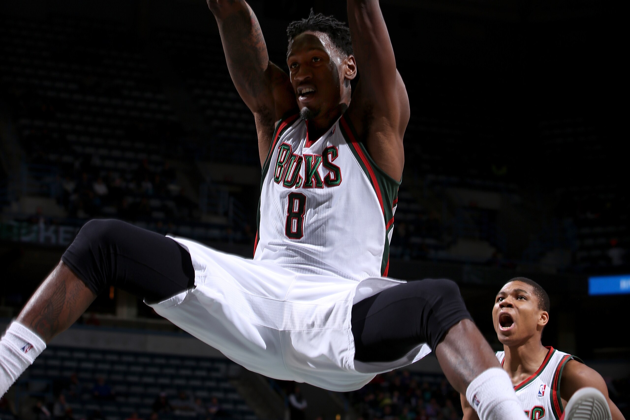MILWAUKEE, WI - January 29: Larry Sanders #8 of the Milwaukee Bucks dunks against the Phoenix Suns on January 29, 2014 at the BMO Harris Bradley Center in Milwaukee, Wisconsin. NOTE TO USER:  User expressly acknowledges and agrees that, by downloading and