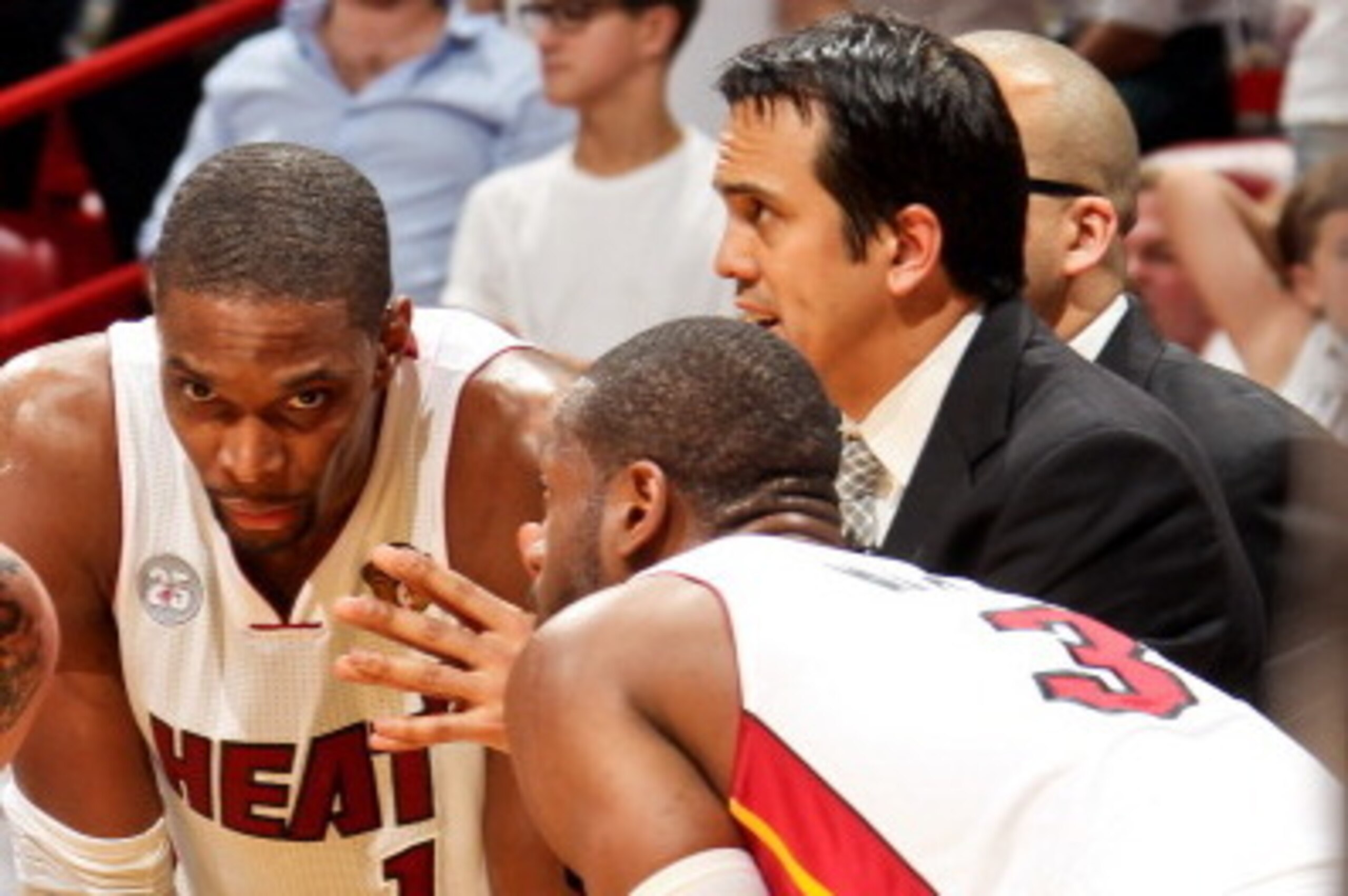 MIAMI, FL - JUNE 6: Head Coach Erik Spoelstra of the Miami Heat leads players Mike Miller #13, Chris Bosh #1 and Dwyane Wade #3 in a huddle before resuming play against the San Antonio Spurs during Game One of the 2013 NBA Finals on June 6, 2013 at Americ MIAMI, FL - JUNE 6: Head Coach Erik Spoelstra of the Miami Heat leads players Mike Miller #13, Chris Bosh #1 and Dwyane Wade #3 in a huddle before resuming play against the San Antonio Spurs during Game One of the 2013 NBA Finals on June 6, 2013 at Americ